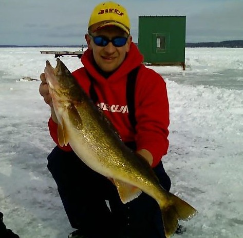 Reel Action Ice Fishing Guide Service for ice fishing Door County Wisconsin for perch, northern pike and walleye on Lake Michigan in Green Bay and Sturgeon Bay Wisconsin.